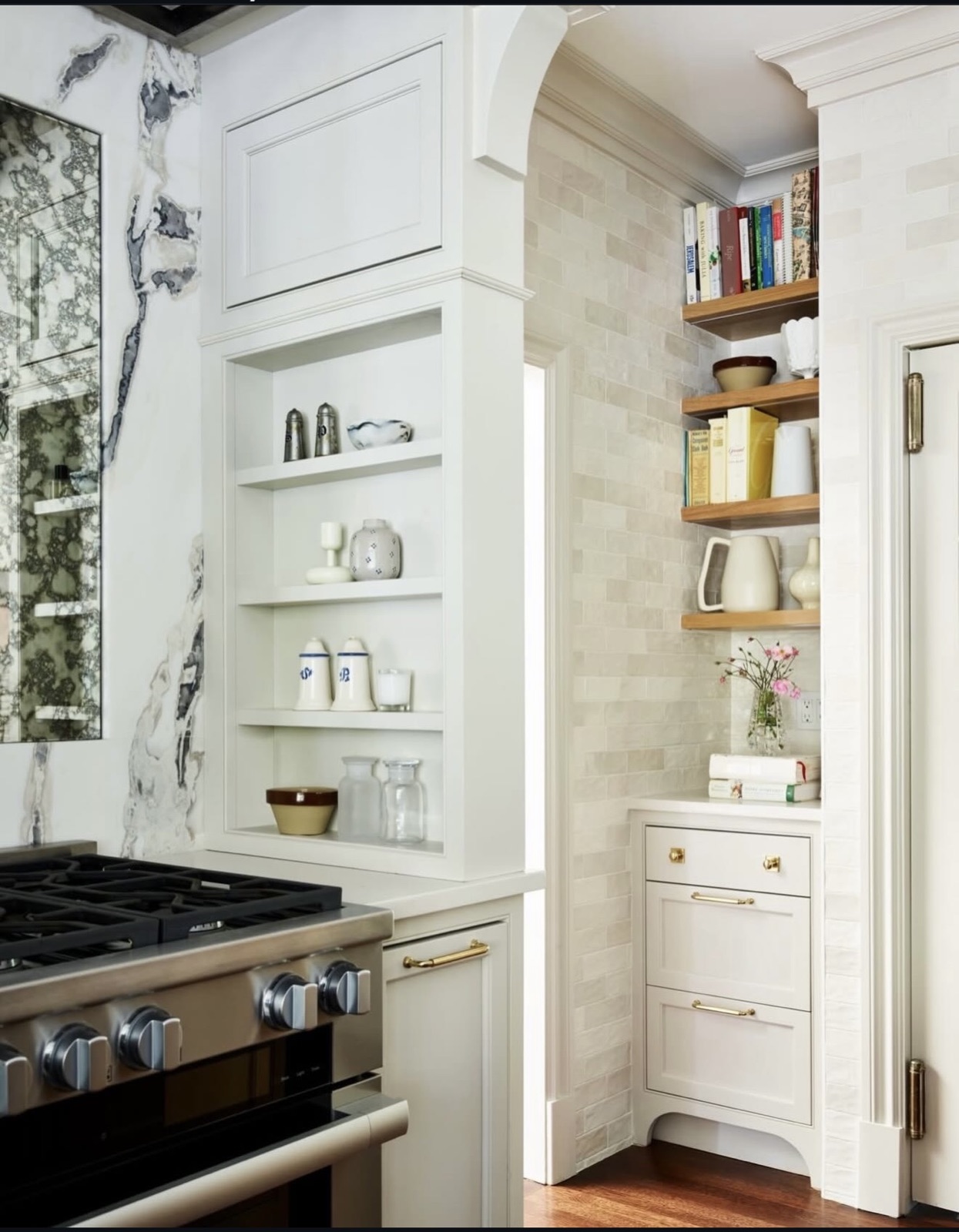 Detailed custom kitchen cabinetry and open shelving